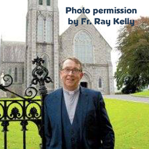 fr.-ray-kelly-outside-church